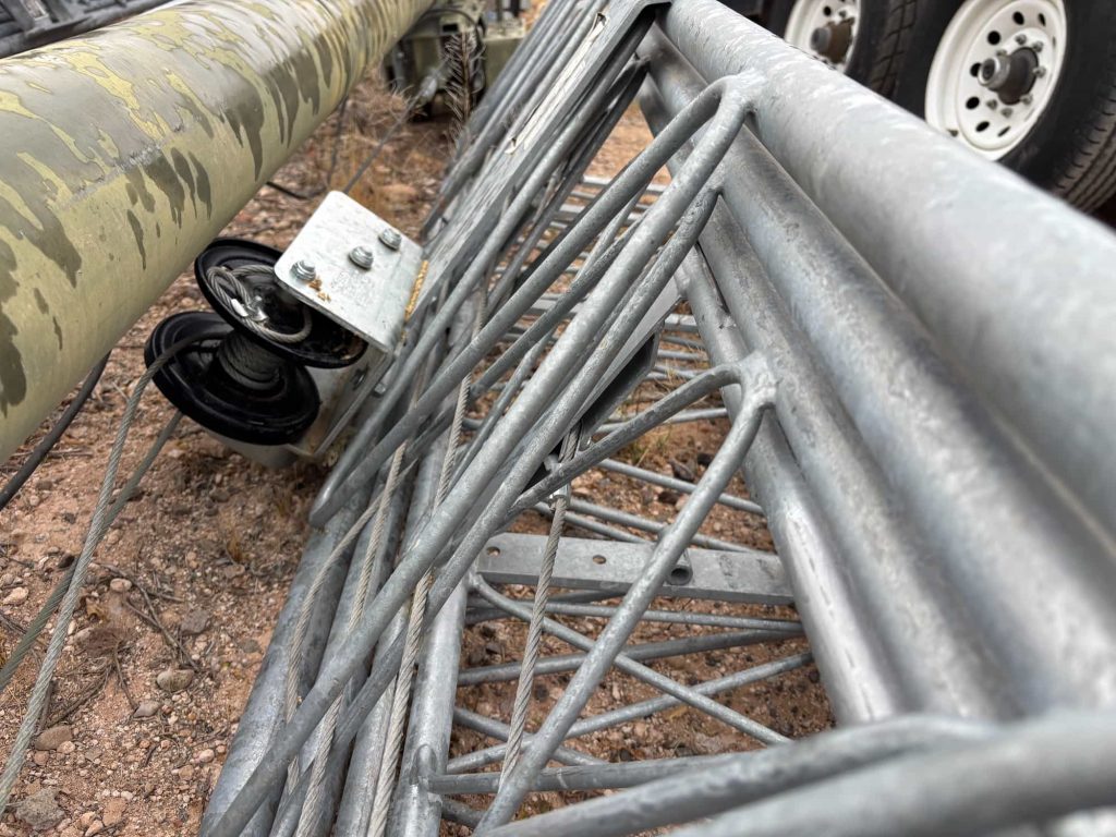Steel tower support structure for amateur radio antennas and rotating beam antenna systems.