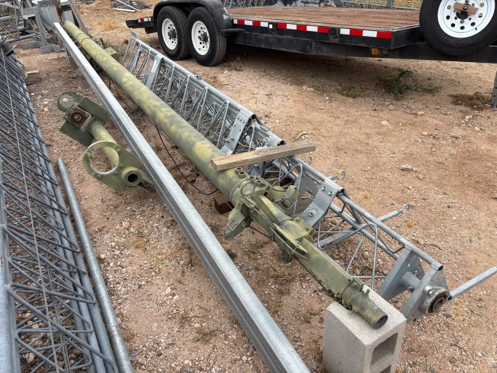 Stacked used ham radio tower sections available for antenna and amateur radio tower installations.